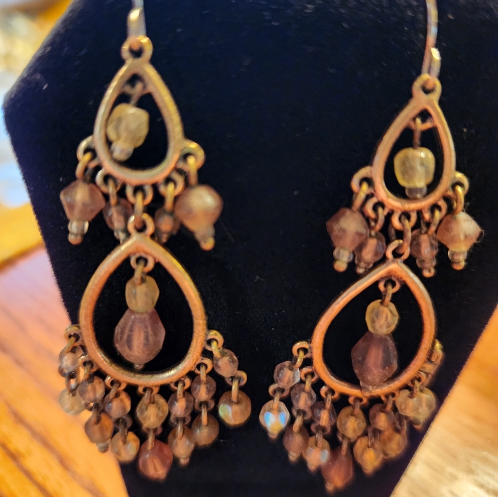 Gold chandelier earrings with green and pink beads